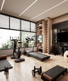 a gym with treadmills, exercise bikes and other equipment