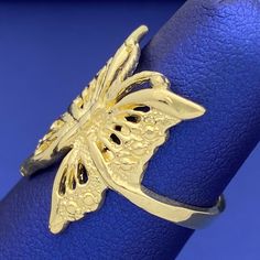 This butterfly ring is a bold statement of beauty and luxury. Crafted with solid 10k yellow gold, this elegant masterpiece will make you feel like royalty. Its intricate details make it a timeless accessory that will be cherished for a lifetime. Grab this stunning piece now and make your presence felt! Metal: 10k GoldType: RingSize: 6.5 Butterfly Shaped White Gold Ring For Formal Occasions, White Gold Butterfly Ring For Formal Occasions, Formal Butterfly Shaped White Gold Ring, Elegant Butterfly Ring For Anniversary, Elegant Anniversary Rings With Butterfly Charm, 14k Gold Butterfly Jewelry For Anniversary, 14k Gold Butterfly Ring For Anniversary, Elegant Round Butterfly Ring For Formal Occasions, Elegant Open Butterfly Ring As Promise Ring