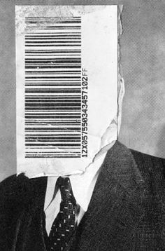 a man wearing a suit and tie with a bar code on his face behind him