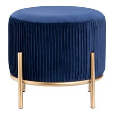 a blue velvet stool with gold legs and a round foot rest on top of it