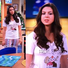 the young woman is standing in front of a tv screen wearing pajamas and t - shirt