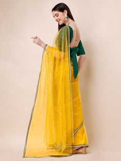 Mustard-colored & Gold-colored sareeDesign DetailsMustard & gold-toned sareeEmbroidered saree with embroidered borderHas zari detailThe saree comes with an unstitched blouse pieceThe blouse worn by the model might be for modelling purpose only. Check the image of the blouse piece to understand how the actual blouse piece looks like. Unstitched Pre-draped Saree With Sheer Dupatta, Unstitched Anarkali Pre-draped Saree With Sheer Dupatta, Gold Anarkali Pre-draped Saree In Traditional Drape, Gold Anarkali Pre-draped Saree With Sheer Dupatta, Pre-draped Saree With Sheer Dupatta For Eid, Festive Bollywood Pre-draped Saree In Chanderi, Bollywood Style Gold Pre-draped Saree With Pallu, Festive Semi-stitched Yellow Traditional Wear, Eid Pre-draped Saree With Dupatta