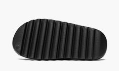 The adidas Yeezy Slide “Onyx” is a monochromatic black colorway of the popular slip-on sandal by Kanye West.  The “Onyx” was released in March 2022 and is a casual footwear style for the summer and beyond.  Its lightweight, one-piece EVA foam body is designed in Onyx, or black, for a versatile look that goes with anything.  Ridges on the outsole provide traction on slippery surfaces.  Release date: March 7, 2022 Adidas Yeezy Slide, Yeezy 750, Adidas Sl 72, Nike X Travis Scott, Yeezy Foams, Yeezy Slides, Low Air Jordan 1, Yeezy 500, Adidas Brand