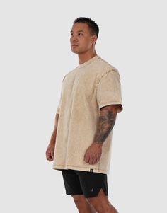 Stand out with our sleek oversized t-shirts, crafted from durable, 100% pre-shrunk cotton. Its acid-washed finish adds a vintage flair, while the roomy fit offers ultimate comfort and freedom of movement. A perfect fusion of style and functionality, this muscle shirt is a must-have for those who value both aesthetics and practicality. Model: Kyle's wearing Dark Grey. His chest is 48.5 inches, and his height is 5'9 he wears 2XL. Why our customers love these men's shirts? 100% premium cotton (won'