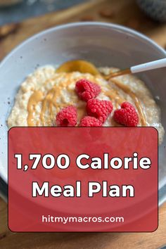 a bowl of oatmeal with raspberries on top and the words 1, 700 calorie meal plan