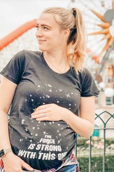 Feel the power of the force with our 'The Force is Strong with This One' maternity t-shirt! When you sensed the strength of the force, you knew this little Jedi was on the way. As you prepare the light-sabers and star-crafts, anticipate the immediate need for Jedi training upon arrival. Embrace the force with this unique design, and get ready for a journey into Jedi parenthood. Beware, the force is strong with this one! May the maternity force be with you! 🌌🤰 #MaternityFashion Jedi Training, The Force Is Strong, Celebrate Mom, He Or She, Funny Mom Shirts