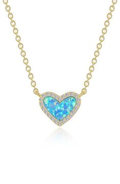 Bring a little sparkle and lustrous romance to any ensemble with this simulated opal heart pendant necklace traced in pavé simulated diamonds. 20" length; 3/8" pendant drop Sterling silver/18k-gold plate/simulated opal/simulated diamond Imported >Diamond Guide Elegant Blue Necklaces For Valentine's Day, Blue Heart Cut Necklace For Formal Occasions, Elegant Blue Heart Necklace, Blue Heart Pendant Necklace For Formal Occasions, Blue Heart-shaped Necklace For Formal Occasions, Elegant Blue Heart Necklace For Valentine's Day, Formal Blue Heart Pendant Necklace, Elegant Blue Heart Necklace For Wedding, Fine Jewelry Blue Heart Necklace