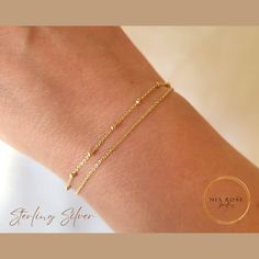 DAINTY CHAIN BRACELET | STERLING SILVER JEWELLERY Gracie is our gold double layered bracelet, featuring a satellite and a plain chain. Perfect for everyday wear or for dressing up on those special occasions WARRANTY This bracelet is covered by our 6 month warranty SIZES S/M is 16cm plus 3cm extension chain M/L is 18cm plus 3cm extension chain DETAILS Made from 925 sterling silver with 18K light gold plating Balls measure approx 2mm PACKAGING Your new jewellery will arrive in a free pouch SHIPPING £1.99 UK shipping via Evri £6.99 International via Evri We aim to ship within 2 days of ordering. If you need it faster, please send us a message and we will see what we can do GIFTING If your order is a gift and being posted directly to the recipient, mark it as a gift and feel free to leave a me Adjustable Double Strand Dainty Bracelet, Adjustable Rose Gold Bracelet With Satellite Chain, Adjustable Silver 14k Gold-filled Chain Bracelet, Dainty 14k Gold-filled Silver Chain Bracelet, Gold Plated Satellite Chain Bracelet Gift, Adjustable Gold Double Chain Bracelet, Gold Plated Satellite Chain Bracelet As Gift, Minimalist Double Chain Bracelets As Gift, Adjustable Double Strand Gold Chain Bracelet