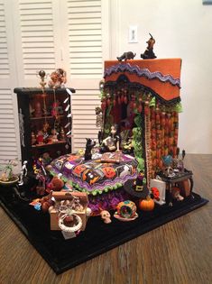 an elaborate halloween display on top of a table