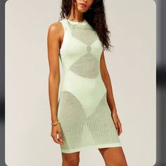 Feel Confident And Look Chic In The Carson Dress. Designed In Soft Tech Mesh, This Mini Silhouette Features A Solid White, High Neckline And A Straight Cut That Will Guarantee To Hug All Your Curves. Material 65% Viscose, 35% Nylon Green Stretch Summer Dress, Green Beachwear Mini Dress For Vacation, Light Green Fitted Casual Dress, Fitted Light Green Casual Dress, Light Green Casual Vacation Dress, Green Mini Dress For Summer Beach, Light Green Fitted Summer Dress, Fitted Light Green Summer Dress, Light Green Fitted Sleeveless Dress