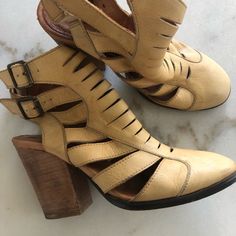 Nib Free People Leather Cutout Boot. Open, Strap Design With An Almond Shaped Toe. Block Heel. Yellow, Beige Color. Belted Ankle Straps. Padded Insole. Made In Spain. Gently Used. Size 37. Booties Shop, Cutout Boots, Yellow Beige, Almond Shaped, Free People Shoes, Strap Design, Ankle Straps, Shoes Heels Boots, Beige Color