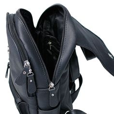 A practical size women's long lasting black leather backpack purse. This medium size backpack is made of heavy cowhide leather with a top handle and double shoulder straps that are adjustable. A magnetic flap top covers two top load large zippered main compartments, with a small inside zip pocket, two small side pockets and a center front zipper pocket, ideal for your large cell phone and help keep your stuff organized. [4#] measures approximately 11 x 7 x 4 adjustable backpack straps top side handle magnetic flap top covering 2 large zipper compartments inside zipper pocket in the largest compartment two small side pockets front and center large zip compartment ideal for you large cell phone. top grain leather durable cowhide leather IMPORTANT SPECIFICATIONS: LEATHER: Cowhide is a standar Black Leather Backpack With Zipper Closure, Black Backpack With Leather Handles For On-the-go, Functional Black Leather Backpack With Anti-theft Pocket, Black Leather Functional Backpack With Anti-theft Pocket, Black Rectangular Leather Backpack With Anti-theft Pocket, Leather Backpack Purse, Leather Travel Bag, Black Leather Backpack, Leather Hats