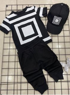 Children's swag combo. Your order includes high quality jeans, a black and white t-shirt as well as a matching cap Black And White T Shirt, 3 Piece Outfit, Black And White T Shirts, Clothing Sets, White T Shirt, White Tshirt, White T, Kids Clothing, Outfit Sets