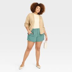 Create an array of cool and confident warm-weather looks with these High-Rise Tailored Shorts from A New Day™. Made from lightweight fabric with a hint of spandex, these high-rise shorts offer all-day cool comfort and easy movement. Designed with a fly hook and zipper, they feature two side pockets to add functional flair to your look, while the solid hue makes for easy pairing with different tops. A New Day™: Style that goes wherever you do. Versatile Spring Loungewear Shorts, Versatile High Waist Shorts For Spring, Relaxed Fit Bottoms For Warm Weather Day Out, Versatile Short Bottoms For Spring, Versatile Short-length Bottoms For Spring, Versatile Short Length Bottoms For Spring, Versatile Short Spring Bottoms, Casual Stretch Shorts For Warm Weather, Casual Bottoms For Warm Weather Day Out