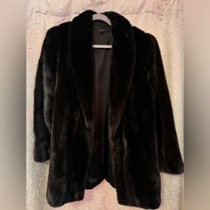 This Medium Coat Is Gorgeous. It’s Genuine Mink Fur And Fits Sizes Small - Large Well. Great Condition And Vintage! Blackglama Brand Fitted Mink Outerwear For Work, Classic Mink-colored Formal Outerwear, Classic Mink Color Formal Outerwear, Chic Mink Outerwear For Formal Occasions, Chic Mink-colored Formal Outerwear, Mink Colored Long Sleeve Evening Outerwear, Chic Mink Formal Outerwear, Formal Long Sleeve Mink Outerwear, Classic Formal Fur Coat For Fall