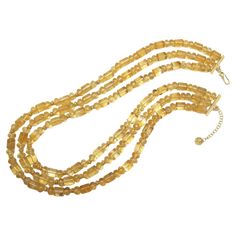 This necklace is so pretty and unusual - and the neutral color goes with everything! It features 3 strands of highly transparent, golden citrine beads of various sizes and shapes, hand-strung with 14k and 18k yellow gold rondelle spacers for extra sparkle. Make this flattering golden necklace your signature piece! Necklaces measure 18.5, 19.5 and 20.5 inches in length Elegant Citrine Gemstone Bead Necklaces, Elegant Beaded Citrine Necklaces, Elegant Citrine Beaded Necklaces, Elegant Citrine Gemstone Beads Necklace, Elegant Amber Necklace With Gold Beads, Luxury Gold Citrine Necklace, Elegant Yellow Necklace With Gold Beads, Gold Citrine Beaded Necklace For Gift, Elegant Amber Crystal Necklaces With Polished Beads