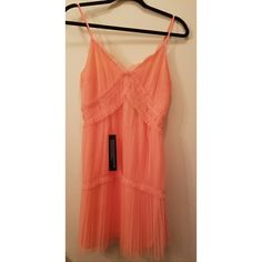 Coral/Orange Colored Dress. Nwt. Size 8. Side Zip. 100% Polyester *X Orange Mini Dress For Summer Evenings, Spring Orange Midi Dress With Spaghetti Straps, Orange Midi Dress With Spaghetti Straps For Spring, Orange Pleated Sleeveless Midi Dress, Orange Pleated Midi Dress For Spring, Summer Orange Pleated Midi Dress, Spring Orange Dress With Spaghetti Straps, Orange Sundress Mini Dress For Party, Orange Sundress For Party