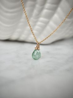 Dainty and delicate, this pretty necklace feature gorgeous forest green aventurine briolette wrapped in gold on a 14 k gold filled chain. Layer it with your favorite necklaces, or wear it alone - it's perfect either way! Please note that as this is a natural stone, each stone is unique and has its own individual characteristics. Colors of stones vary and may look different to how you view them on your monitor.  Made using the highest quality USA and UK sourced materials. Aventurine💚 Green avent Aventurine Crystal Necklaces, Green Pendant Necklace, Aventurine Jewelry, Green Aventurine Necklace, Aventurine Necklace, Green Pendant, Green Pendants, Jewelry Dainty, Pretty Necklaces