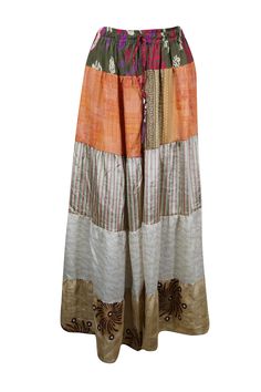 Embrace the seasons with this beautifully flared maxi skirt, handcrafted from recycled saree fabric in rich Beige, Orange, and floral prints. Featuring a comfortable drawstring waist and a graceful ankle-length silhouette, this boho-chic piece is perfect for everything from casual market strolls to vibrant beachside festivals. Designed to let your adventurous spirit shine, the skirt is available in one versatile size (S/M/L), offering a perfect blend of bold style and sustainability. Its captiva