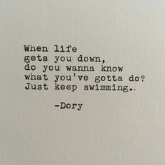 an old typewriter with the words, when life gets you down, do you wanna know what you've gota do? just keep swimming