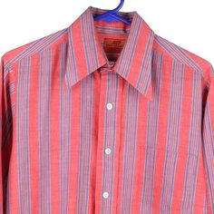 Description:Vintage red Van Heusen shirt, fits medium.GENDER: mens CONDITION: very goodSTYLE: shirtERA: 1990sCOLOUR: redFABRIC: cotton Vintage Red Shirt For Spring, Retro Red Cotton Shirt, Vintage Red Summer Shirt, Vintage Red Long Sleeve Top, Retro Red Summer Shirt, Retro Red Shirt For Spring, Vintage Red Short Sleeve Shirt, Vintage Pink Collared Shirt, Red Vintage Short Sleeve Shirt