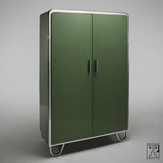 a green cabinet sitting on top of a white floor next to a gray wall in the background