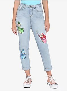 Always wanted a fairy godmother? Now you've got three! From  Sleeping Beauty , these light wash mom jeans fit just the way you like them and have patches of Flora, Fauna and Merryweather on front. 97% cotton; 1% spandex; 2% other fiber Wash cold; dry low Imported Listed in junior sizes Mommy And Me Frozen Shirts, Disney World Shirts Frozen, Mommy Daughter Shirts Disney, Arm Sleeve Disney, Disney Cute Clothes, Disney Mom Sweaters, Disney Princess Modern Clothes, Womens Disney Clothes, Dresses To Wear To Disneyland