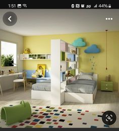 a child's bedroom with yellow walls and white furniture, including a bookcase