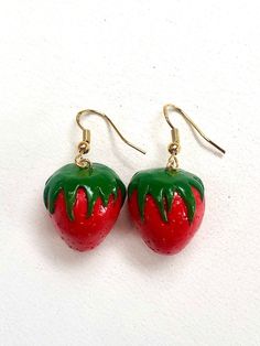 These adorable, quirky hand-sculpted Polymer Clay red strawberry earrings are perfect for casual day-to-day wear to help express your style! In addition, 25% of the money from your purchase is donated to Rise Against Hunger, a non-profit charitable organization helping provide millions of meals to those in need all over the world. Their mission is to end world hunger by 2030, but only with your help! Casual Jewelry With Fruit Design For Gifts, Casual Fruit Design Jewelry Gift, Handmade Red Casual Earrings, Quirky Red Jewelry For Gifts, Handmade Casual Red Earrings, Casual Red Nickel-free Earrings, Playful Red Pierced Earrings, Affordable Quirky Red Earrings, Strawberry Earrings Aesthetic