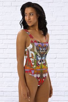 This one-piece swimsuit for all figures will bring out your best features. Enjoy the smooth fabric and the flattering design, and show it off by the sea or pool! • 82% Polyester, 18% Spandex • Fabric weight: 6.78 oz/yd² (230 g/m²), weight may vary by 5% • Chlorine-resistant fabric • Cheeky fit with a scoop neckline and a low scoop back • Zig-zag stitching • Double-layer front • Four-way stretch material stretches and recovers on the cross and lengthwise grainsSize guide CHEST (inches) WAIST (inches) HIPS (inches) XS 33 ⅛ 25 ¼ 35 ⅜ S 34 ⅝ 26 ¾ 37 M 36 ¼ 28 ⅜ 38 ⅝ L 37 ¾ 29 ⅞ 40 ⅛ XL 41 33 ⅛ 43 ¼ 2XL 44 ⅛ 36 ¼ 46 ½ 3XL 47 ¼ 39 ⅜ 49 ⅝ CHEST (cm) WAIST (cm) HIPS (cm) XS 84 64 90 S 88 68 94 M 92 72 98 L 96 76 102 XL 104 84 110 2XL 112 92 118 3XL 120 100 126 Fitted Sleeveless One Piece For Beach Season, Fitted Sleeveless One Pieces For Beach Party, Fitted Sleeveless One-piece For Beach Party, Stretch Printed Swimwear For Pool, Printed Stretch Beachwear Bodysuit, Printed Stretch Bodysuit For Beachwear, Stretch Printed Bodysuit For Beachwear, Printed Stretch Tankini For Sunbathing, Fitted Multicolor One-piece For Sunbathing