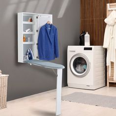 an ironing board and dryer in a laundry room