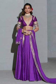 Purple pleated lehenga. Paired with a padded blouse with sequin embellishments and dupatta.
Components: 3
Pattern: Embellished
Type Of Work: Sequins
Neckline: Deep V Neck
Sleeve Type: Half Sleeves
Fabric: Georgette, Net and Raw Silk.
Color: Purple
Other Details: 
Sequin embellished cuffs
Sequin embellishments on dupatta
Occasion: Destination Wedding - Aza Fashions Shimmer Lehenga, Purple Lehenga, Low Cut Blouses, Halter Neck Blouses, Crop Top Lehenga, Lehenga Pattern, Chaniya Choli, Purple Fabric, Engagement Outfits