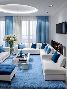 a living room with blue and white furniture