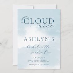 a blue and white wedding card with the words cloud nine on it, as if it were