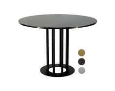 a round table with four different colored circles around it and the base is made out of metal