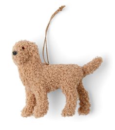 a brown dog ornament hanging from a string