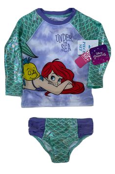 New Disney’s The Little Mermaid, Ariel Rash Guard & Bikini Bottoms Swimsuit UPF 50+￼ SIZE: 2 Toddler From Disney’s Princess collection Features: Ariel wrap around with Flounder asleep on her back “UNDER THE SEA” Title Long sleeves in green that look like scales Bikini bottoms with hygienic liner Shop with confidence, 100% authentic designer brand merchandise guaranteed, great prices and returns accepted; if returned it must have all tags & hygienic liner still intact. Your refund all be your pur Blue Character Print Swimwear For The Beach, Playful Mermaid Swimwear For Summer, Playful Character Print Swimwear, Fitted Cartoon Print Sets For Playwear, Playful Fitted Sets With Character Print, Multicolor Character Print Swimwear For Beach, Fitted Cartoon Print Swimwear For Swimming, Fitted Swimwear With Character Print For Swimming, Fitted Swimwear With Cartoon Print For Swimming