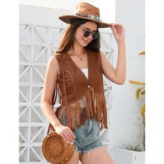 This vintage 70s vest exudes a retro vibe with its timeless design and soft texture, perfect for adding a touch of bohemian flair to any outfit. Western Style Sleeveless Vest For Spring, Trendy Brown Vest For Summer, Trendy Brown Summer Vest, Hippie Sleeveless Vest For Spring, Sleeveless Brown Vest For Festivals, Brown Sleeveless Fringe Vest, Brown Bohemian Vest With Fringe, Bohemian Brown Vest With Fringe, Brown Bohemian Fringe Vest