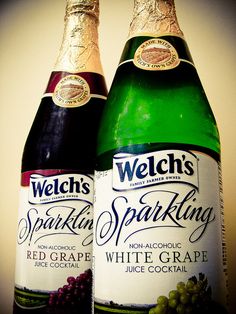 two bottles of sparkling white grape wine