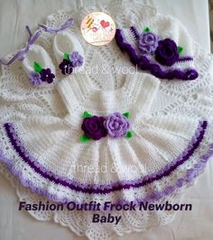 a crochet baby dress and hat with purple flowers on the bottom is shown