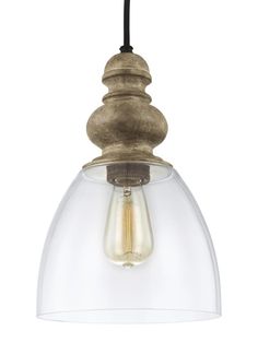 a light fixture with a clear glass shade on the bottom and an old fashioned bulb hanging from