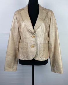 "Such an unusual piece, all in the details! THE DETAILS: Creamy beige undertones with bronze/copper detail within the alligator print, lined, fitted/tailor cut, at hip length, front button closure, front flat pockets ~ Era: 00's ~ Material: 100% Leather ~ Garment Tag Size: 8 ~ Today's Fit Guesstimate: S/M ~ Condition:  Excellent, no flaws ~ Brand: Neiman Marcus ~ Pockets: yes ~ Shoulder pads: yes MEASUREMENTS (Flat Lay): ~ Bust/Pit to Pit 19\" ~ Waist 17 1/2\" ~ Length 23\" *Compare personal mea Luxury Gold Blazer For Office, Gold Fitted Luxury Blazer, Elegant Gold Blazer For Business, Designer Gold Blazer For Business, Elegant Gold Blazer For Semi-formal Occasions, Designer Gold Blazer For Semi-formal Events, Designer Gold Blazer For Semi-formal Occasions, Designer Fitted Gold Blazer, Gold Designer Fitted Blazer