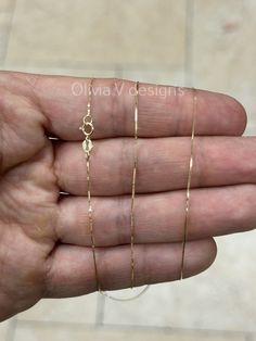 14K Solid Yellow Gold Box Necklace Chain 0.50mm Stamped: 14K Average Weights: *16"   .65 Grams *18"   .73 Grams *20"  .80 Grams *22"  .86 Grams *24"  .95 Grams *26"  1.03 Grams *28"  1.09 Grams *30" 1.17 Grams Lock: Ring Clasp Arrives in a Velvet Gift Pouch and includes FREE SHIPPING to the USA To see more chains and other handcrafted jewelry collections, please visit my storefront here : https://www.etsy.com/shop/OliviaVdesigns About OliviaVDesigns: Thanks for taking a look at Olivia V. Designs  Been doing jewelry all my life. This is my specialty :) I'm a jewelry designer working in my hometown Brooklyn, where I was born and raised. I have a cute workshop in my house where I create all my jewelry and designs. Always trying to create new ideas, infused with classic collection styles Pleas 14k Stamped Link Jewelry For Gift, 14k Gold Snake Chain Necklace For Gift, 14k Gold Snake Chain Necklace As Gift, Stamped 14k Link Chain Necklace Gift, 14k Link Chain Necklace As Gift, Designer Working, Lock Ring, Simple Chain, Box Necklace