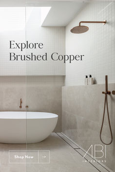 a bathtub and shower in a bathroom with the words explore brushed copper above it