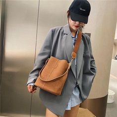 Material: PU Texture: Soft Closed: Buckle Size: 9.1"L x 6.3"W x 11"H in; It is enough to hold daily stuffs including cell phones, sunglasses, wallet, key etc. Baldric: Adjustable shoulder strap نظارات شمسية, Bucket Handbags, Pu Bag, Suede Fashion, Leather Bucket Bag, Leather Bucket, Types Of Bag, Nubuck Leather, Bag For Women