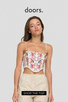 Make a statement with this embroidered corset top by ALICE K. This top is perfect for summer styling. With hand and machine embroidery, this unique top can be dressed up or down for any occasion. A cropped length style makes it easy to wear in the heat, while the embroidery adds a touch of personality. Shop this look at doors.nyc today and #supportTALENT Fitted Floral Embroidery Crop Top For Festival, Fitted Floral Embroidered Crop Top For Festival, White Embroidered Cropped Crop Top, White Embroidered Cropped Top, Festival Embroidered Crop Top, Fitted Embroidered Crop Top For Festivals, Fitted Embroidered Festival Crop Top, Embroidered Corset Top, Chic Business Attire