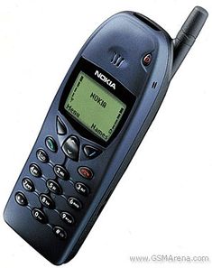 an old cell phone is shown on a white background