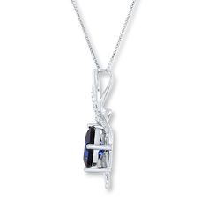 Elegant curves decorated in round and marquise lab-created white sapphires complement a cushion-cut, lab-created blue sapphire in this mesmerizing necklace for her. The sterling silver pendant glides along an 18-inch box chain that secures with a lobster clasp. Formal Jewelry With Lab-created Sapphire Birthstone, Formal Birthstone Jewelry With Lab-created Sapphire, Sapphire Pendant Jewelry With Lab-created Sapphire, Pendant-shaped Lab-created Sapphire Jewelry, Anniversary Pendant Jewelry With Lab-created Sapphire, Lab-created Sapphire Pendant Jewelry, Fine Jewelry With Lab-created Sapphire And Diamond Accents, Pear-shaped Lab-created Sapphire Jewelry, Sapphire Marquise Jewelry With Diamond Accents