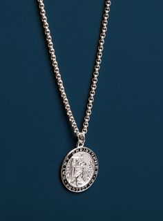 The name "Christopher" means Christ-bearer, and alludes to the legend of the man carrying the Christ Child across the river. St. Christopher is the patron saint of travelers and of children. Chain: Rolo 2.1 mm Clasp: Lobster Chain: 925 Sterling Silver Pendant: 925 Sterling Silver with Black enamel Pendant: 20 mm diameter Chain: Choose length from drop down menu Pendant is flat on the back side of the medal. St Christopher Medal, St Christopher, Saint Christopher, Protection Necklace, Patron Saints, Round Pendant, Black Enamel, Sterling Silver Pendant, The River