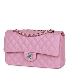 This Medium Classic Double Flap bag is in dark pink caviar leather with light gold tone hardware and features a front flap with signature CC turnlock closure, half moon back pocket, and adjustable interwoven light gold tone chain link and dark pink leather shoulder strap.   The interior is lined in dark pink leather with the "love letter" zipper compartment underneath the first flap, an "outer" slit pocket under the second flap, and an interior compartment with two open pockets separated by a "lipstick" compartment. Collection: 22S   Origin: France   Condition: Pristine, new or never worn   Accompanied by: Chanel box, Chanel dustbag, carebook, ribbon   Measurements: 10" width x 6" height x 2.75" depth; 16.5" strap drop (9.5" doubled) Chanel Box, Classic Flap Bag, Gold Chanel, Pink Chanel, Leather Thread, Chanel Caviar, Classic Flap, Sierra Leone, Pink Leather